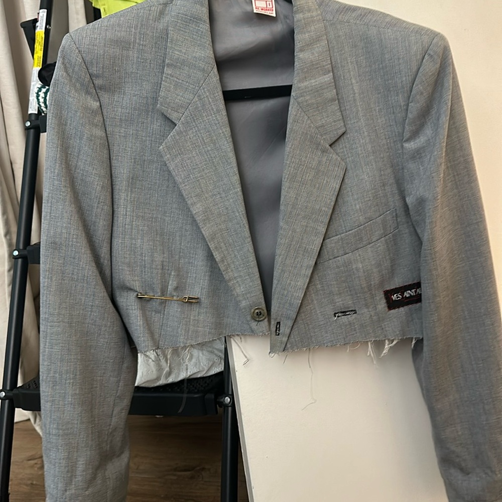 Reworked vintage YSL crop blazer. Cut YSL tag out &stitched on front as design